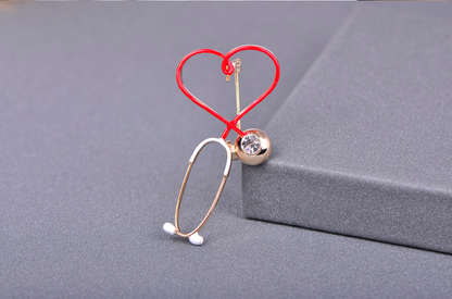 Creative stethoscope brooch